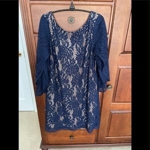 Lilly Pulitzer navy lace overlay dress.  Flattering styling size L. Fully lined.